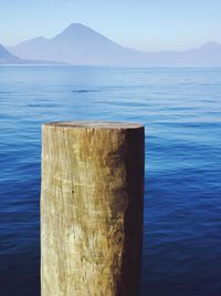 Scenic view of sea against blue sky