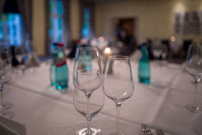 Close-up of wineglasses on table in restaurant