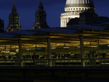 Low angle view of illuminated cathedral against sky at night