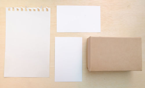 Close-up of blank papers on table