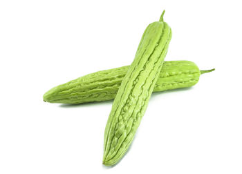 Close-up of green leaf against white background