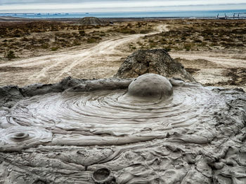 Rocks on land against sky