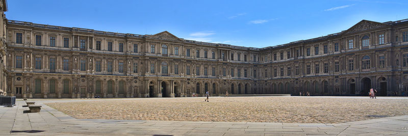 Cour carree in louvre museum during summer