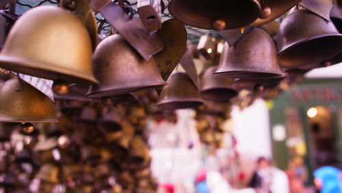 Close-up of clothes hanging in market