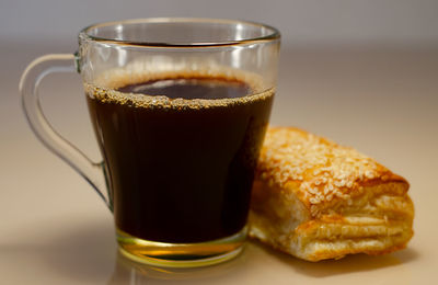 Close-up of coffee cup on table