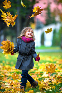 Happy child in autumn