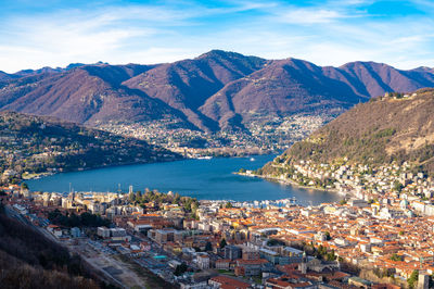 The city of como, the lake, the lakeside promenade, the buildings, photographed from above.