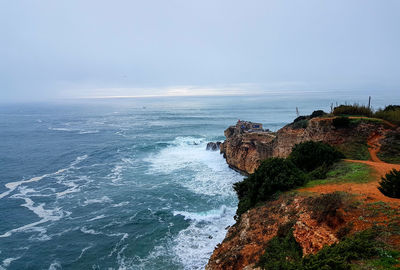 Scenic view of sea against clear sky