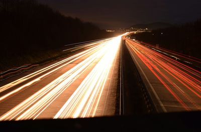 Light trails on road at night