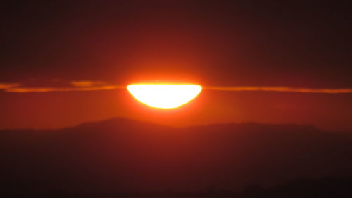 Silhouette of mountain at sunset