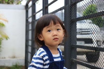 Portrait of cute asian girl looking away