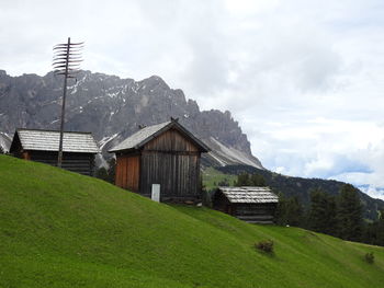 House on field against sky