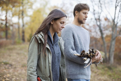 Young couple looking at camera