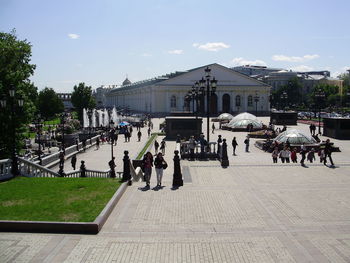 People at town square against sky