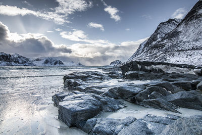 Scenic view of frozen sea against sky