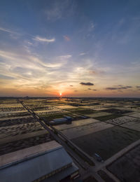 Aerial view of landscape against sky during sunset