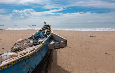 Africa fishing boat mission on the beach full of fishing tools waiting for the next fishing trip