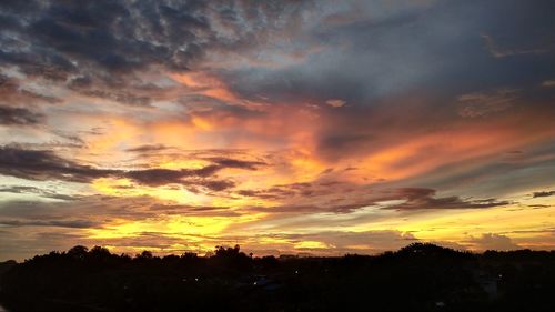 Scenic view of dramatic sky during sunset