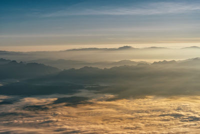 Scenic view of mountains against sky during sunset