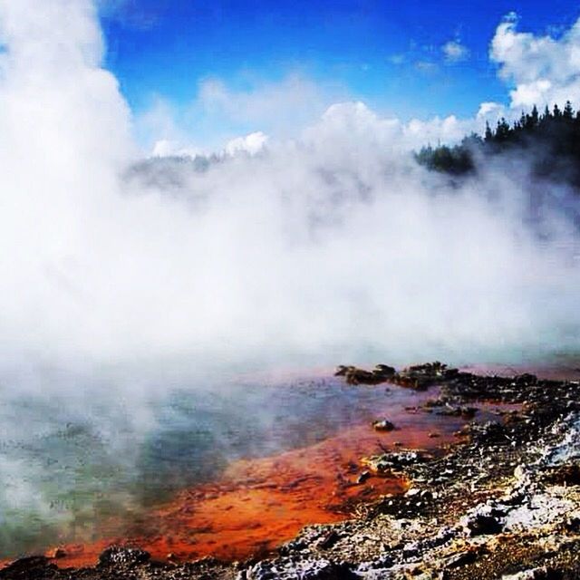 scenics, beauty in nature, mountain, sky, tranquil scene, tranquility, cloud - sky, nature, physical geography, landscape, geology, non-urban scene, power in nature, water, idyllic, fog, waterfall, cloud, rock - object, smoke