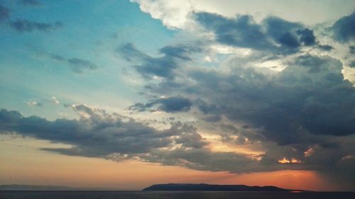 Low angle view of dramatic sky over sea