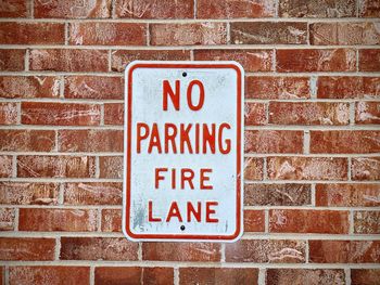 High angle view of text on brick wall