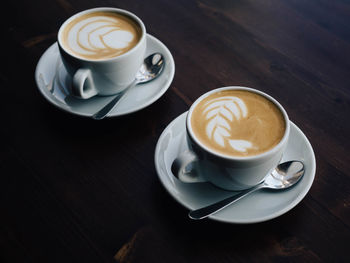 High angle view of cappuccino on table