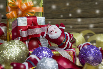 Close-up of christmas decoration with gift boxes