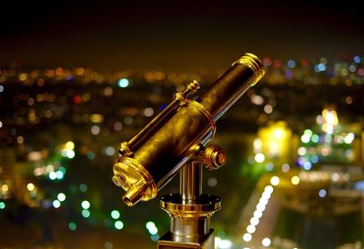 Close-up of tourist binoculars at night