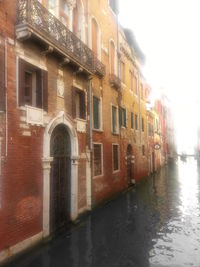 View of canal along buildings