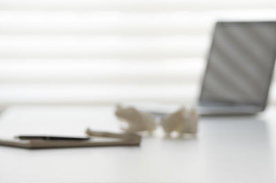 Close-up of paper over white background