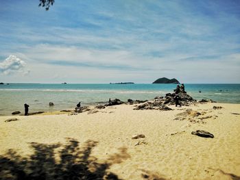 Scenic view of beach against sky