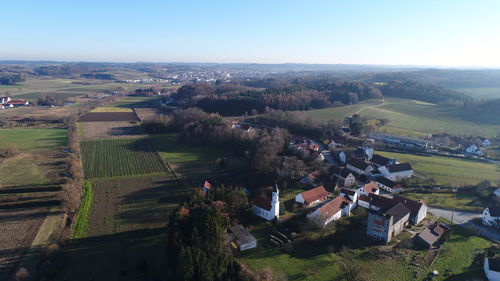 High angle view of agricultural field against clear sky