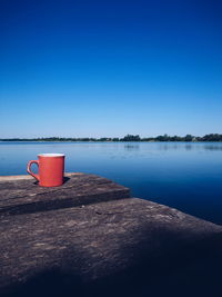 Coffee cup against blue sky