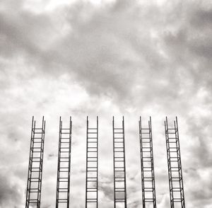 Low angle view of building against cloudy sky