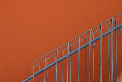 View of railing against orange wall