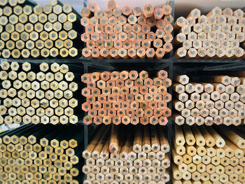 Full frame shot of pencils on shelves for sale in store