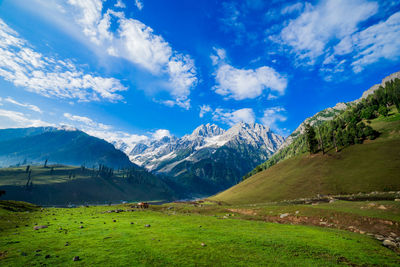 Scenic view of snowcapped mountains against sky