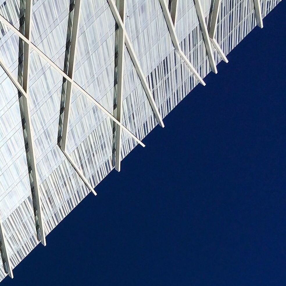 connection, built structure, architecture, bridge - man made structure, low angle view, engineering, clear sky, bridge, metal, suspension bridge, sky, pattern, day, no people, diminishing perspective, railing, outdoors, support, steel cable, footbridge