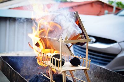 Close-up of burning matchstick