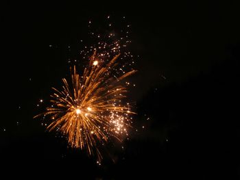 Low angle view of firework display