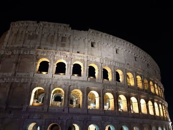 Low angle view of historical building against sky at night