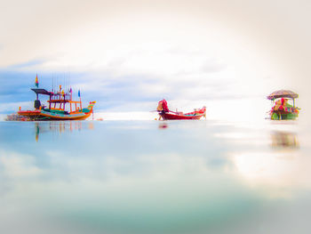Boat in sea against sky