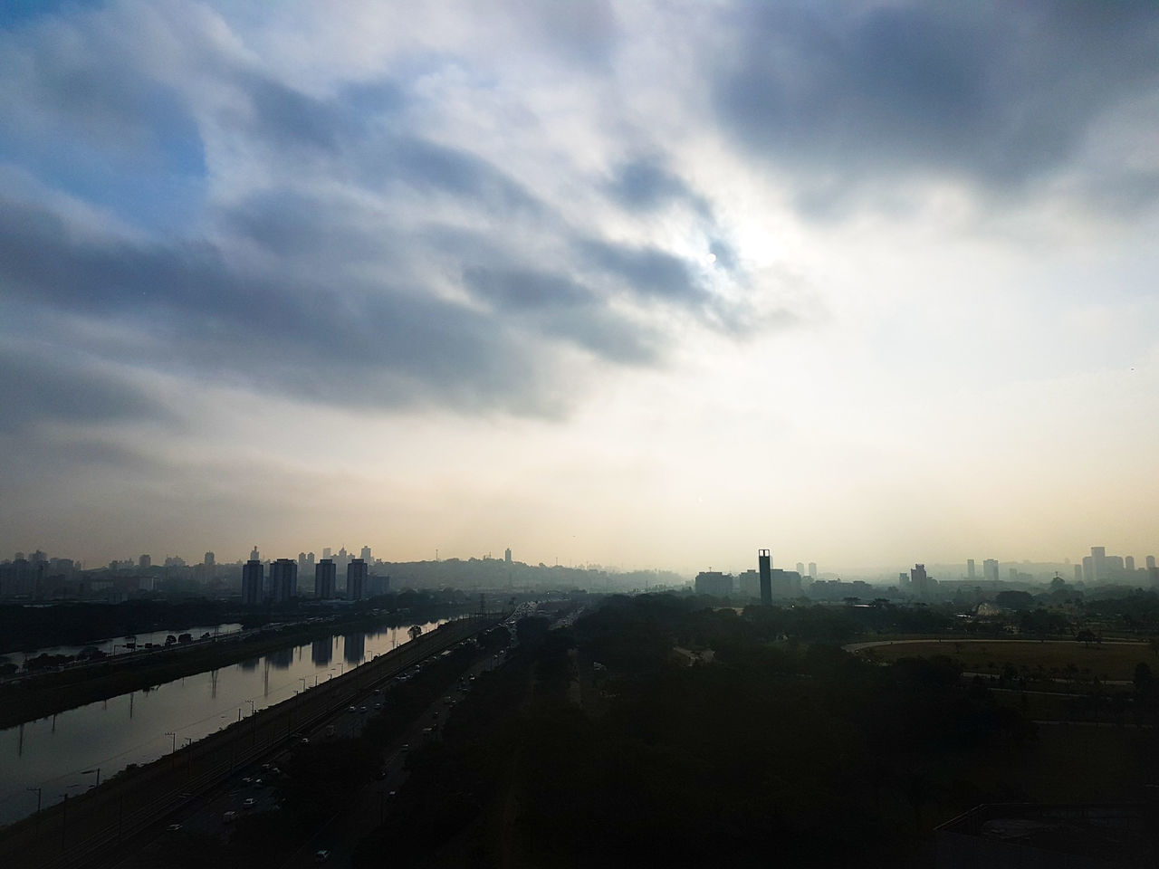 HIGH ANGLE VIEW OF CITY BUILDINGS AGAINST SKY