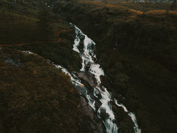 High angle view of waterfall in forest