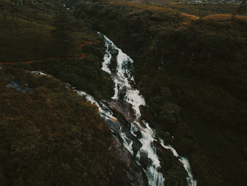 High angle view of waterfall in forest