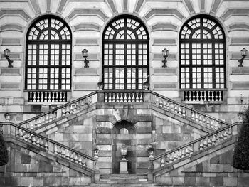 People on staircase of building