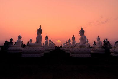 Panoramic view of temple building against sky during sunset