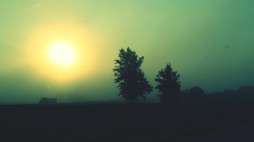 Scenic view of landscape at sunset