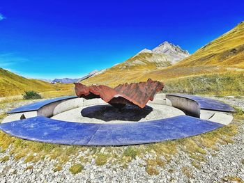 Scenic view of landscape against clear blue sky